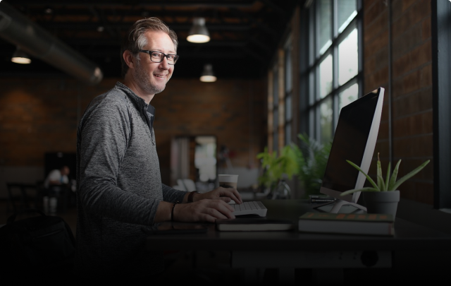 Happy finance team using GST software solution